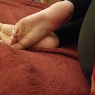 bare feet on soft red blanket photo gallery by Fairy Feet