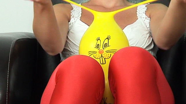 bursting yellow latex balloon video from FetishIslands