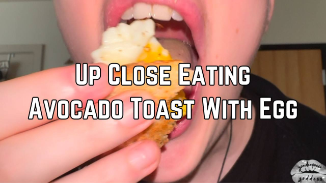 Eating Avocado Toast With Egg Close Up video from Phoenix Bates