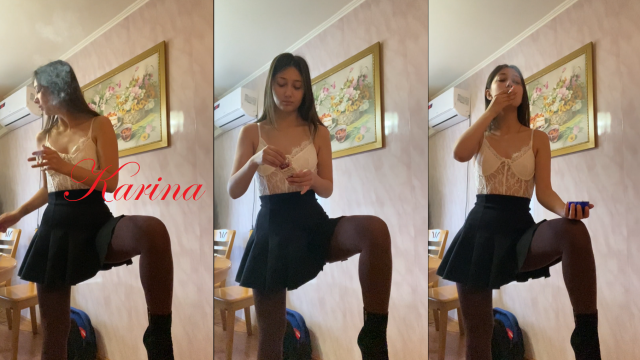 Karina craves and smokes two cigs at once in lingerie and miniskirt video from Karina Smoking