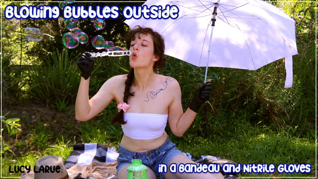 Blowing Bubbles Outside in a Bandeau and Nitrile Gloves video from Lucy LaRue