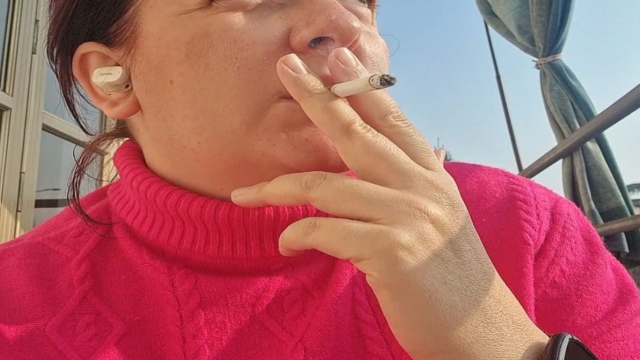Smoking on a cold winter afternoon video from NicoleFetish