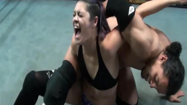 A DIFFERENT TYPE OF MARRIAGE PROPOSAL - Santino vs Amo video from WORLD WIDE MIXED WRESTLING